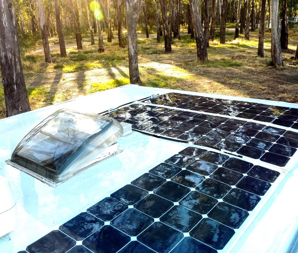 Caravan with flexible solar panels installed