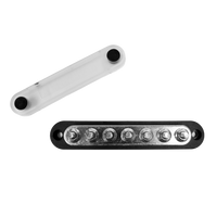 Black 150A busbar with 7 M6 studs and removed clear protective cover