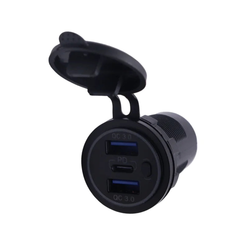 Angled view of USB socket face showing dual USB-A and single USB-C ports surrounded by a blue ring