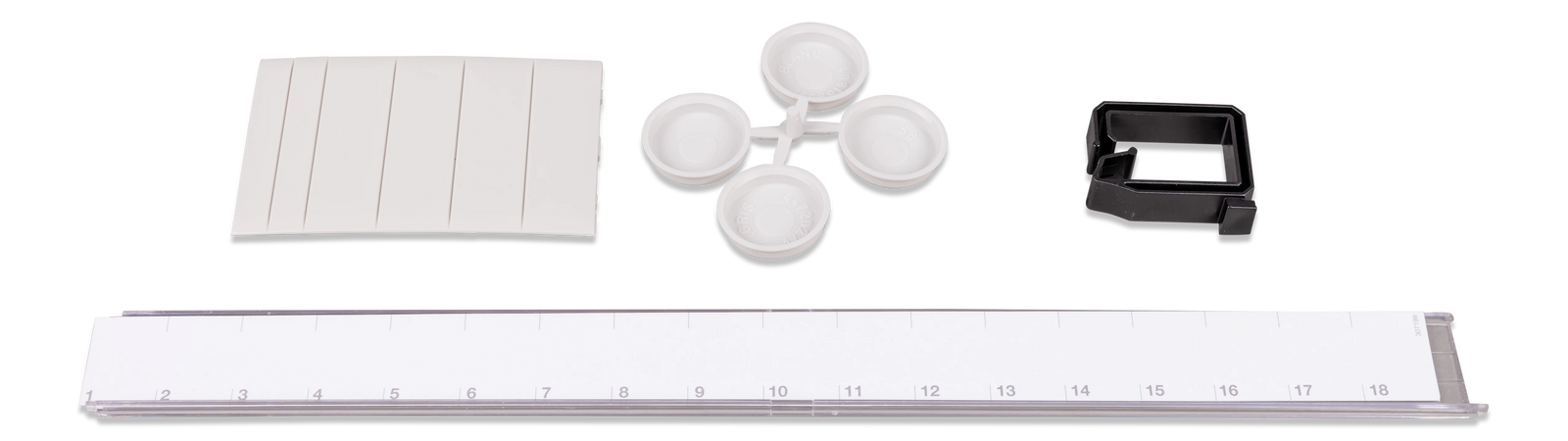 Included parts for the anti-islanding box including screw caps and blanking plates
