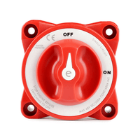 Top-down view of red battery isolation switch with clear ON OFF position labels