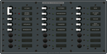 Front view of 22-position 230V AC marine distribution panel with grey finish and backlit toggle switches
