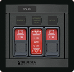 Marine control panel with three red rocker switches and sliding lockout covers for battery management
