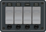 Front view of Blue Sea 4-position fused DC switch panel in slate grey with Contura switches