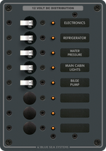 Blue Sea 8-position 12V DC distribution panel with 15A toggle circuit breakers and backlit labels