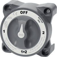 Front view of grey heavy-duty battery selector switch with rotary dial showing OFF, 1, 2 and 1+2 positions