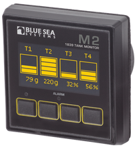 Blue Sea M2 digital tank monitor with OLED display showing levels for four tanks