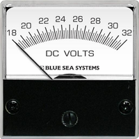Analog micro DC voltmeter with a white face showing a scale from 18 to 32 volts
