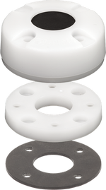Exploded view of a white waterproof antenna cable clam showing cap with seal, spacer and mounting gasket