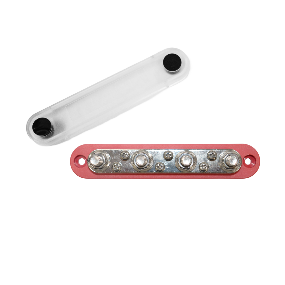 Red busbar with four studs and six screws, shown with its clear protective cover removed