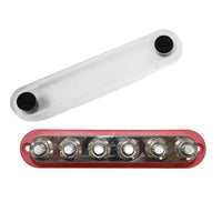 Top-down view of red busbar with cover removed to show six M10 studs and mounting holes