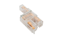 Clear 1-in 2-out AC power splitter showing internal brass terminals and transparent polycarbonate housing