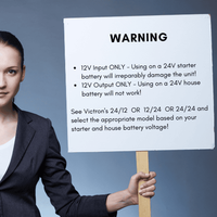 Warning sign stating 12V input and output only for the DC-DC charger