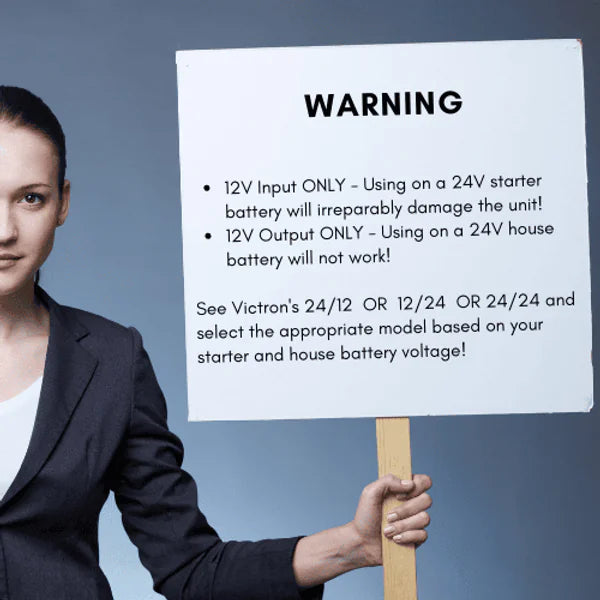 Warning sign stating 12V input and output only for the DC-DC charger