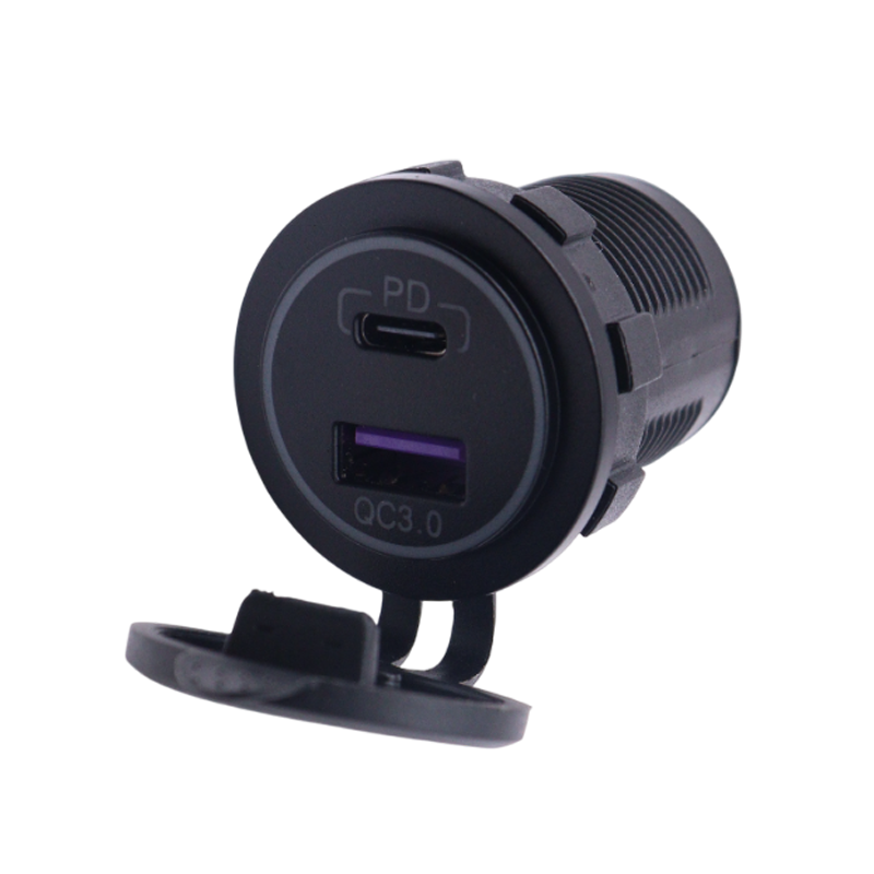Front view of black dual USB socket with open cap showing USB-C PD and USB-A QC3.0 ports