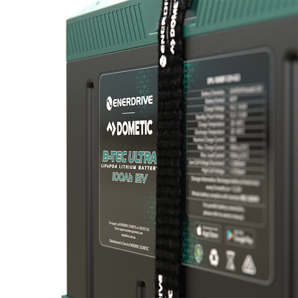 Close-up of the technical specification label and Enerdrive Dometic branding on the battery front