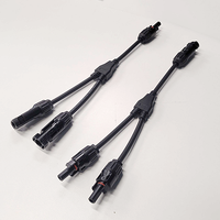Pair of black Y-branch solar panel parallel wiring connectors with MC4 compatible ends
