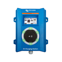 Front view of EV charging station with green light ring indicating a ready or active charging state