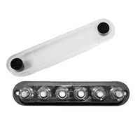 Overhead view of 6-stud busbar with clear cover removed showing nickel-plated terminals