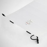 Rear view of the white backsheet on the flexible solar panel