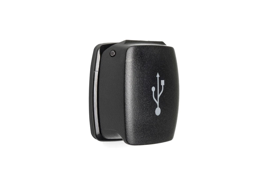 Weatherproof dual USB charger with closed flip lid featuring a white USB icon