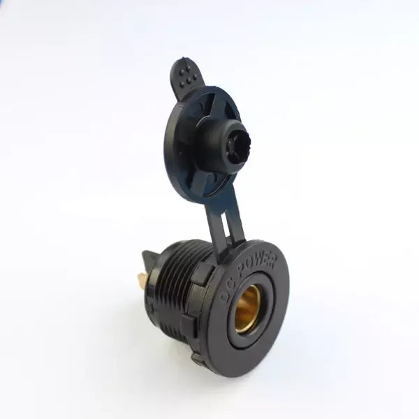 Angled view of black flush mount Merit socket with open dust cap and threaded body