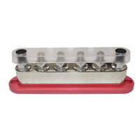 Front view of red busbar with clear cover installed showing voltage and amperage rating text