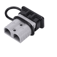 Black rubber dust cover loop installed around a grey 50A Anderson plug housing