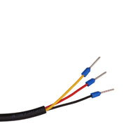 Close-up of red, black and yellow wiring with blue crimp ferrules on a pressure sensor cable