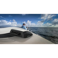 Scanstrut multi cable seal installed on a boat deck with fisherman in the background