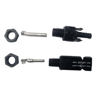 Disassembled MC4 panel mount kit components showing locking nuts, crimp terminals and connector housings