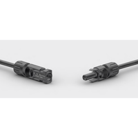 Male and female MC4 connectors facing each other with safety warning text visible