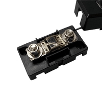 Close-up angled view of a MIDI fuse bolted securely onto the fuse holder base studs