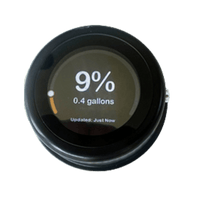 Circular Mopeka LCD remote display unit showing 9% tank level and 0.4 gallons readout