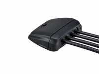 Black horizontal cable seal with four cables securely routed through the waterproof bung