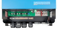 Detailed view of AC input and output screw terminals and M8 DC battery connection bolts