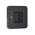 Angle view of black dual USB-C charging socket with square bezel and charging icon
