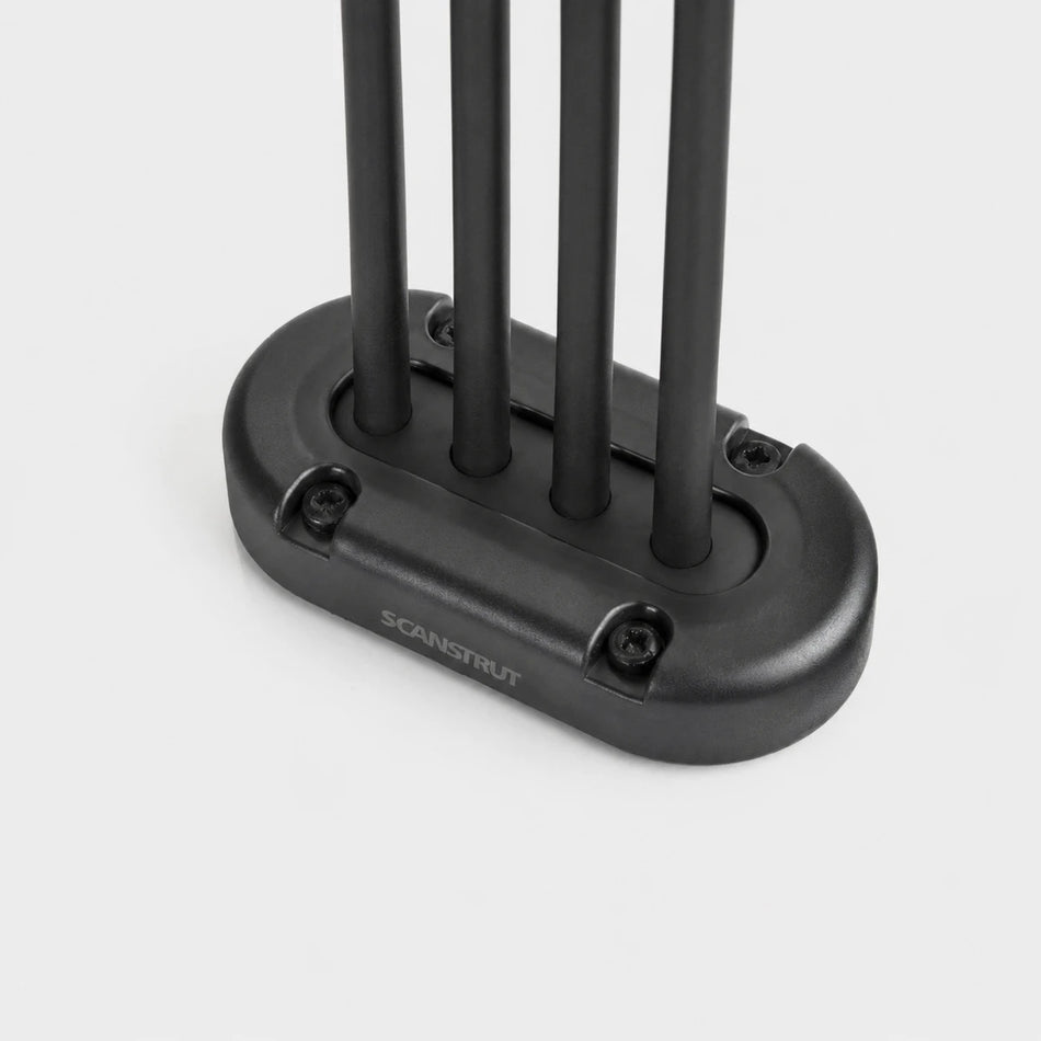 Black multi cable seal with four black cables passing through a vertical waterproof entry