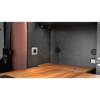 Installed TILE USB socket on a textured interior panel of a van