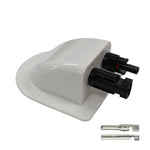 Angled view of white solar cable entry cover with integrated black connectors and loose crimp terminals