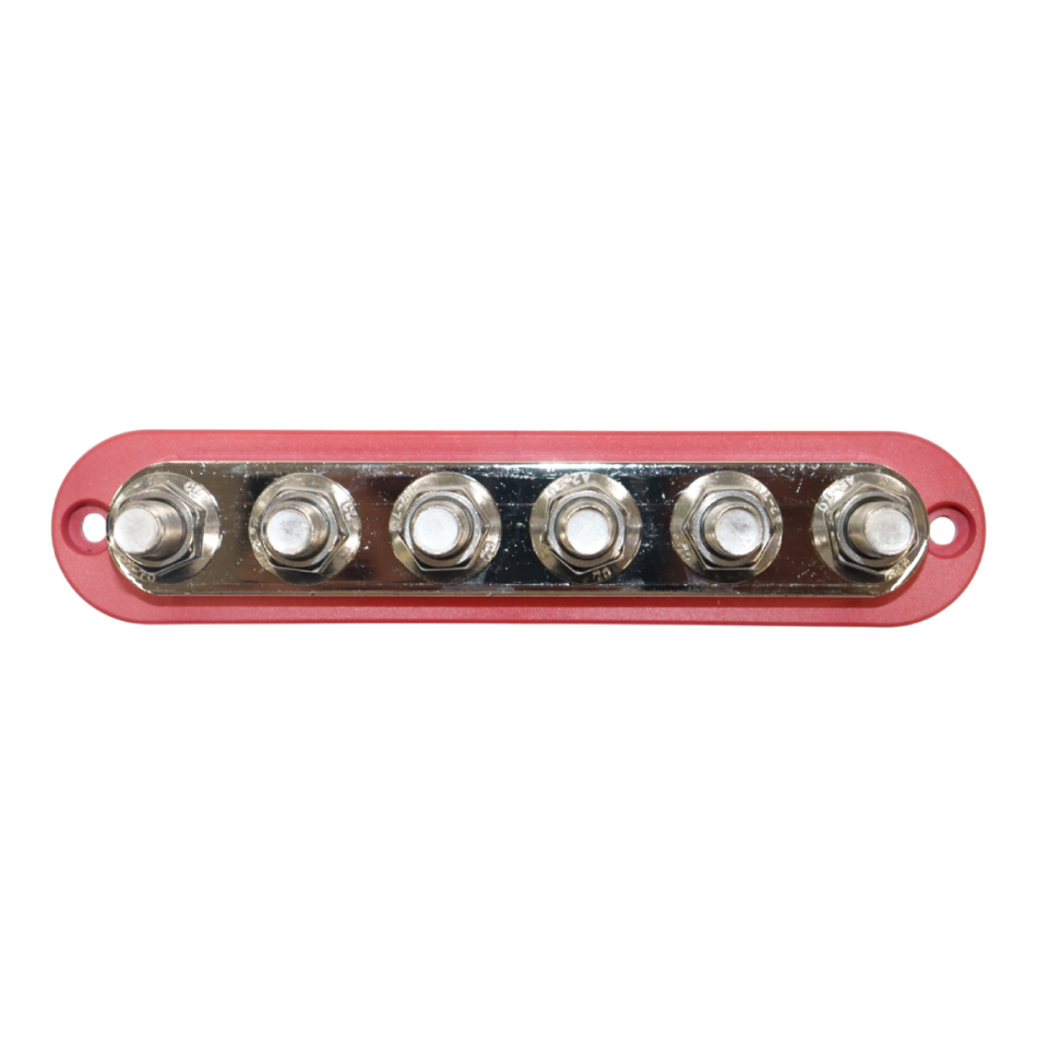 Top-down view of red busbar featuring six stainless steel studs on a nickel-plated plate