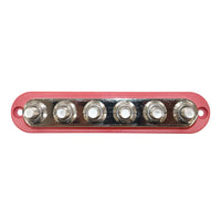 Top-down view of red busbar featuring six stainless steel studs on a nickel-plated plate
