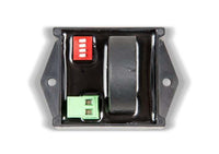 Top-down technical view of AC current sensor showing DIP switches and internal components