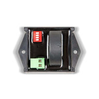 Top-down technical view of AC current sensor showing DIP switches and internal components