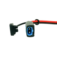 Close-up of the DC connector socket and protective weather cap