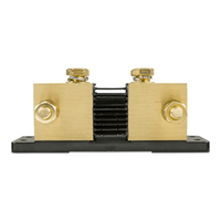 Close-up side view of the 2000A SmartShunt cooling fins between two large brass terminal blocks