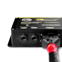Bottom perspective of the regulator with CANbus ports and a connected wiring harness