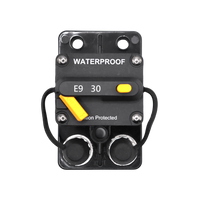 Front view of 30A waterproof DC circuit breaker with manual reset switch and protective caps
