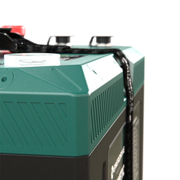 High-angle view of the battery corner showing the recessed carry handle and IP67 sealed design