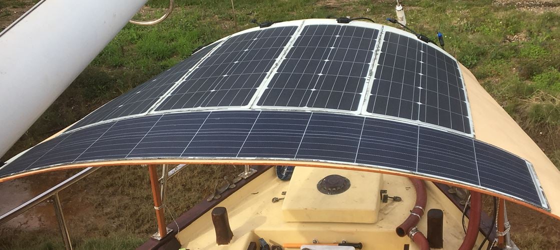 eArche solar panels are light and thin enough to flex around curved boat canopy